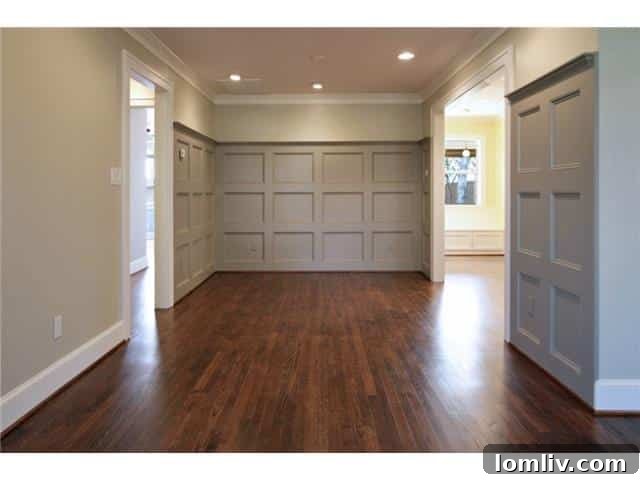 Stevens Park Stone-Clad Marvel: Inside Pure Divinity 5 2308-W.-Colorado-Dining - Elegant Dining Area with Wainscoting
