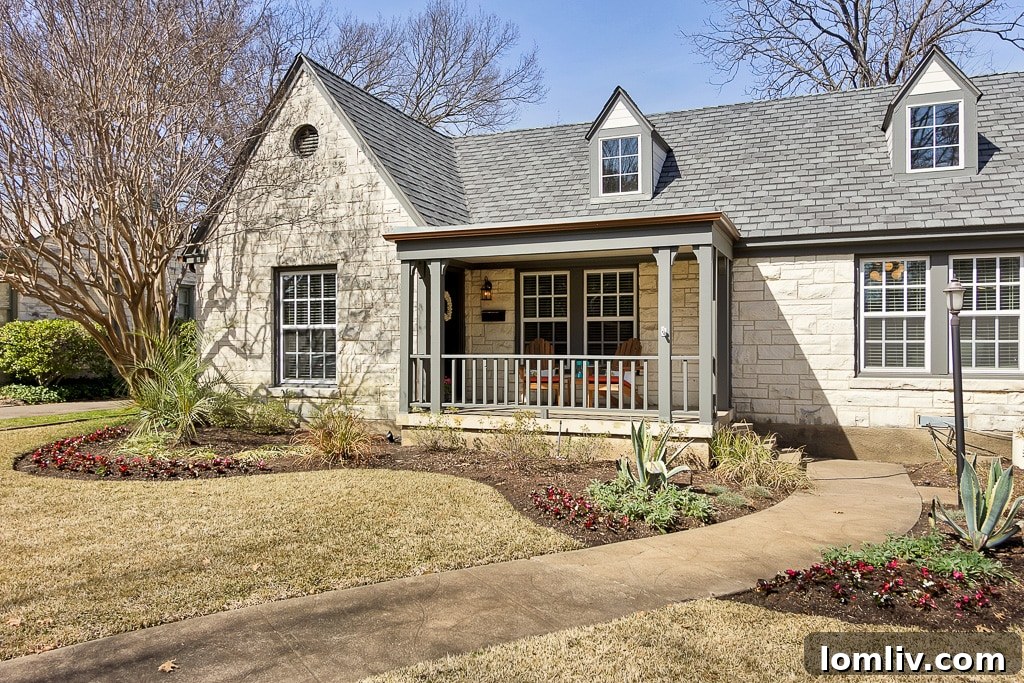 Charming East Dallas Tudor Gem Won't Last Long 2 Exterior view of the charming 1938 Austin stone English Tudor cottage at 6917 Casa Loma Avenue, Dallas, TX 75214