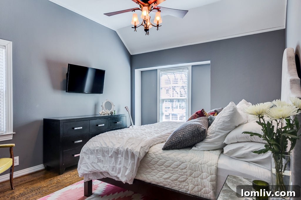 Charming East Dallas Tudor Gem Won't Last Long 14 Another perspective of the master bathroom, highlighting its modern yet charming aesthetic.