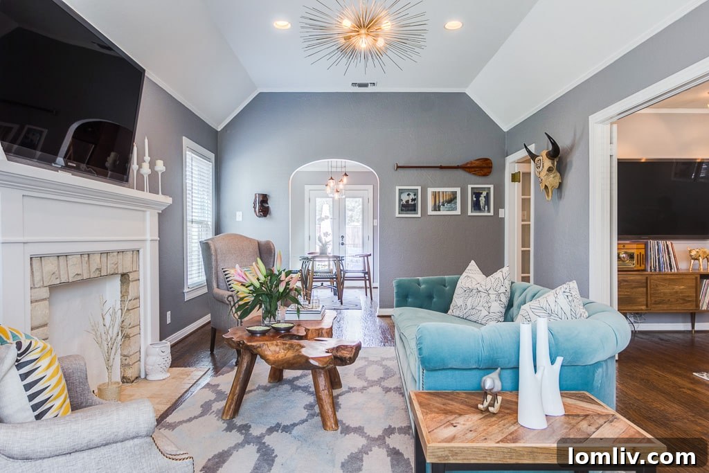 View of the open concept living area leading into another space, highlighting the home's spacious feel.