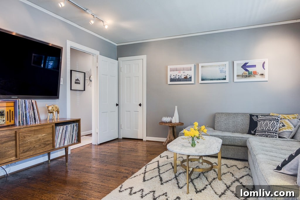 Charming East Dallas Tudor Gem Won't Last Long 7 The renovated bathroom showcasing modern fixtures and thoughtful design elements.