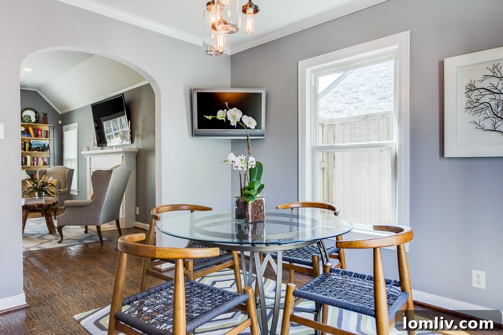 Charming East Dallas Tudor Gem Won't Last Long 8 A detailed shot of the kitchen area, showing updated appliances and finishes.