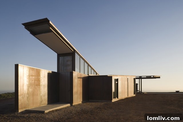 Architectural detail showing a unique window or door mechanism, a signature 'gizmo' by Tom Kundig