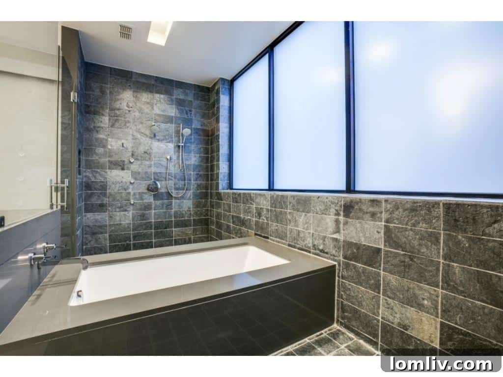 Bluffview Bound: Jordan Spieth's Travis Street Condo Is Now Available 15 4321 Travis Walk - Master Bathroom with Center Tub