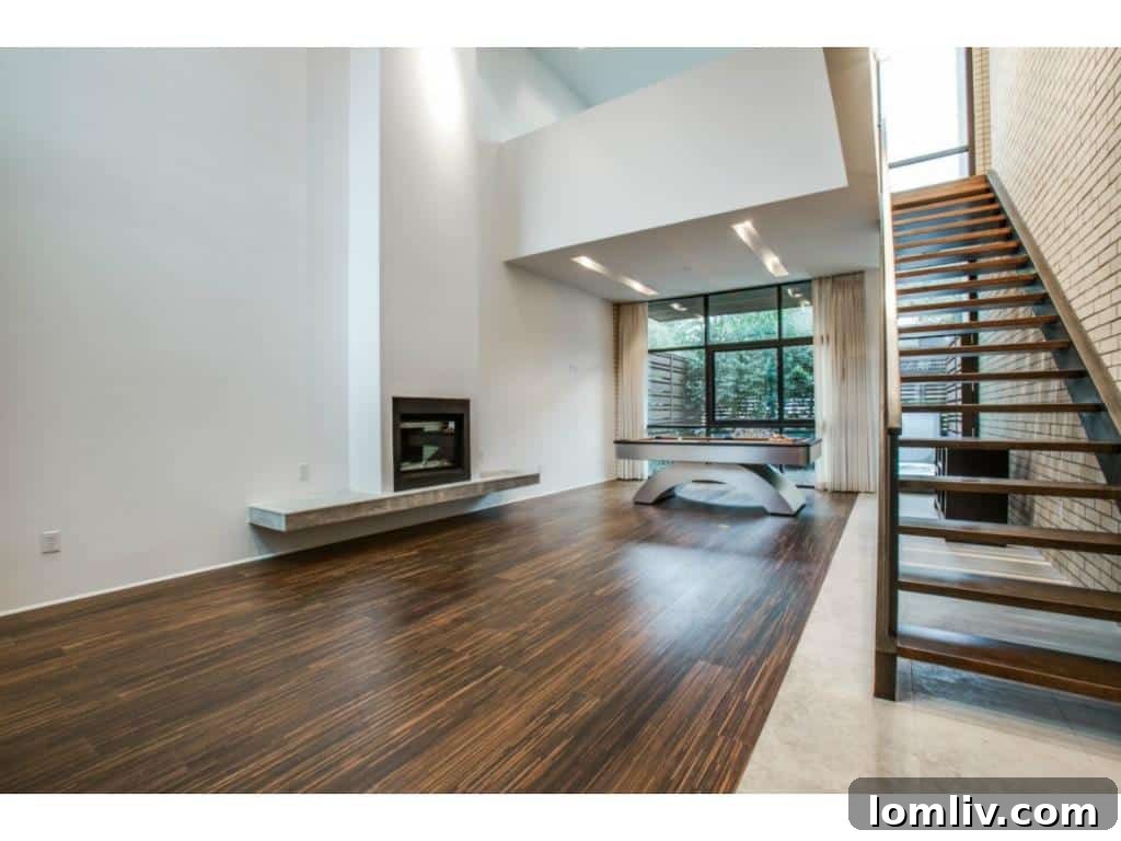 Bluffview Bound: Jordan Spieth's Travis Street Condo Is Now Available 5 4321 Travis Walk - Spacious Living Room with Pool Table