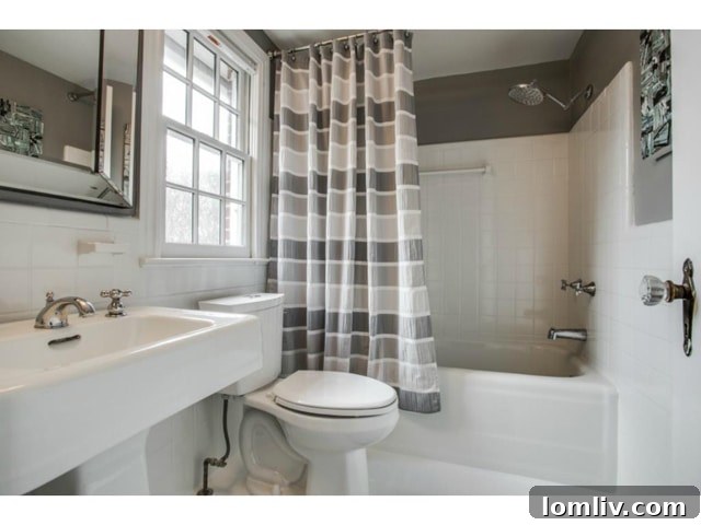 Stylish upstairs hall bathroom with modern updates