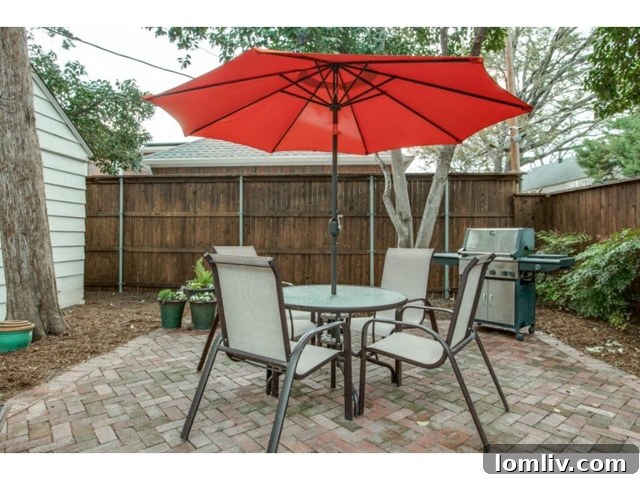 Inviting backyard patio perfect for entertaining at 6827 Gaston Avenue