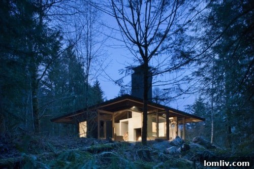 Studio House interior with studio lighting, designed by Tom Kundig.