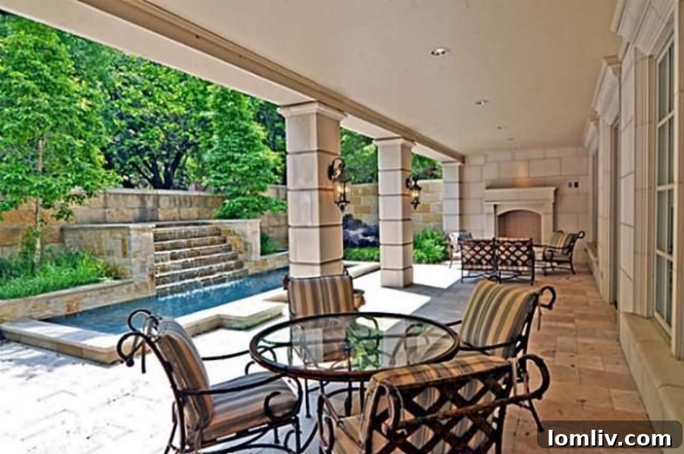 Elegant Entryway with Staircase and Wet Bar