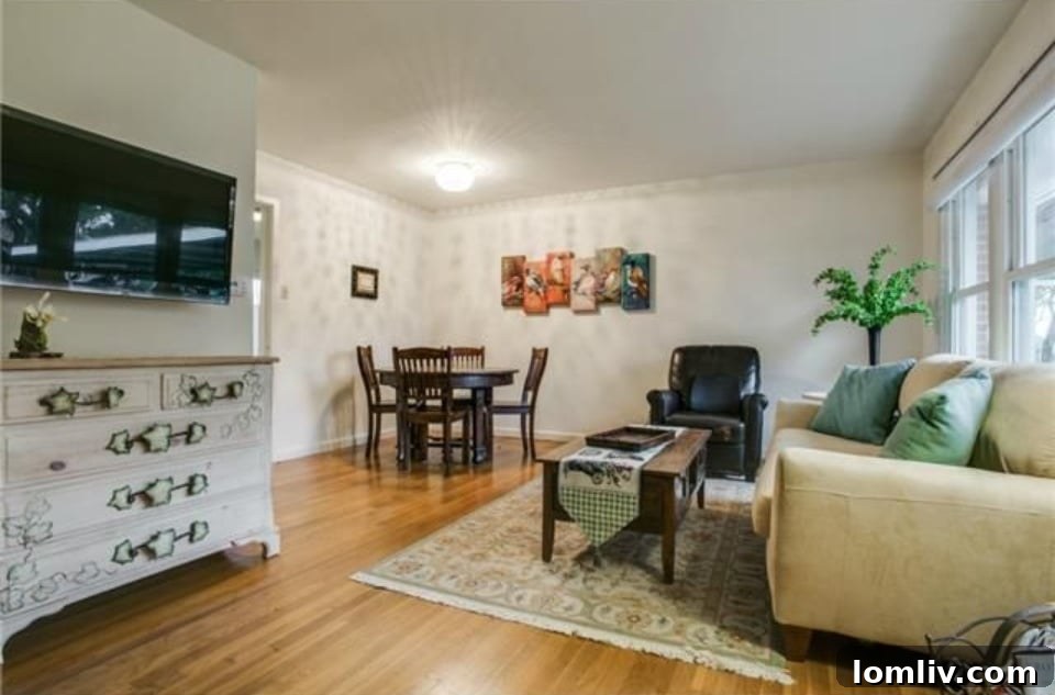 Interior view showcasing beautiful original hardwood floors in an East Dallas midcentury house