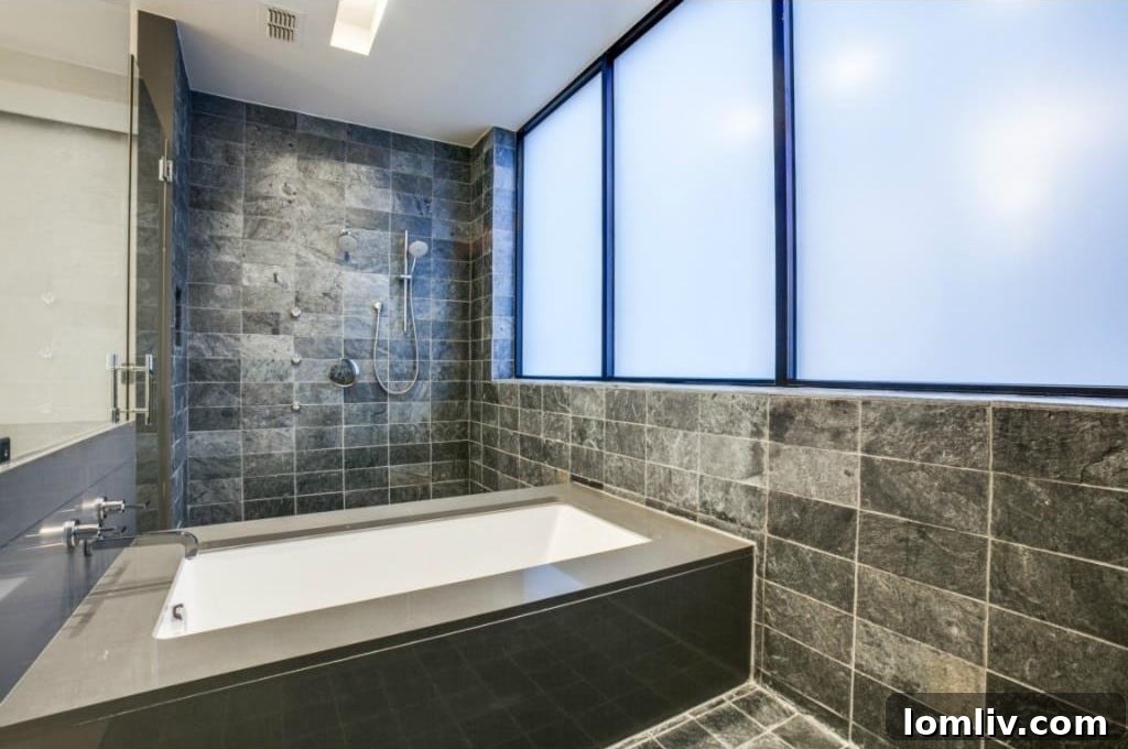 Elegant freestanding tub in master bathroom