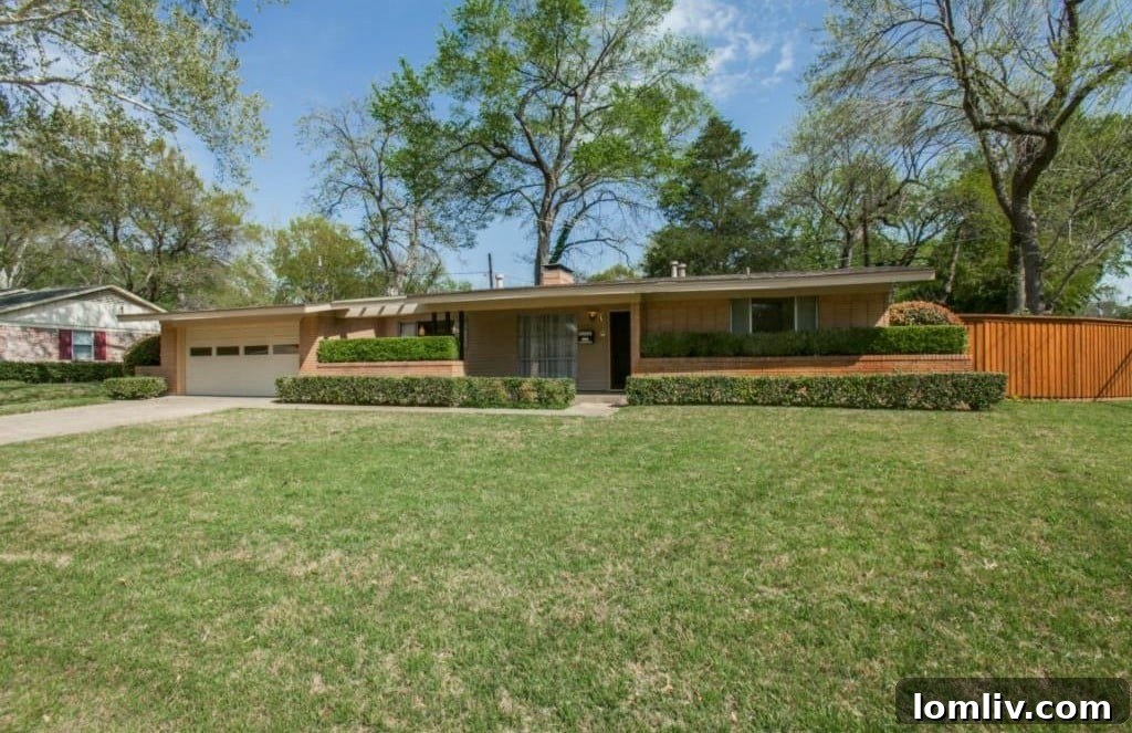 Exterior view of 10504 Lake Gardens Dr, a classic Mid-Century Modern home in East Dallas