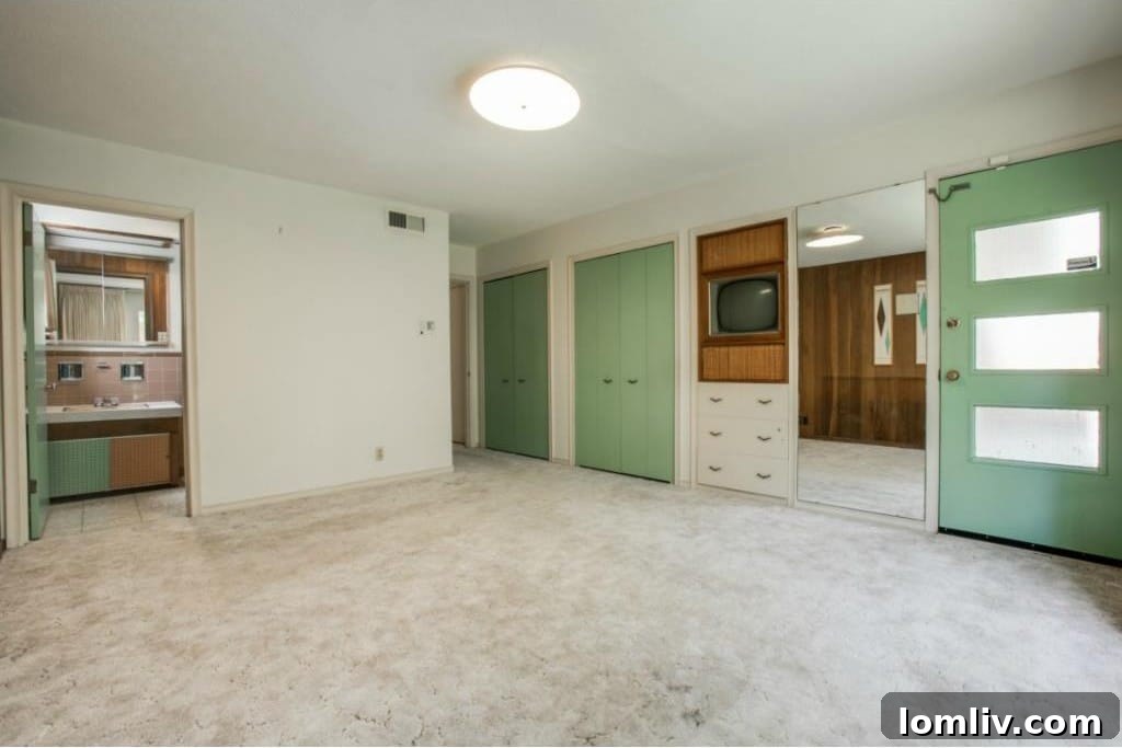 Living area with brick fireplace and integrated planter divider