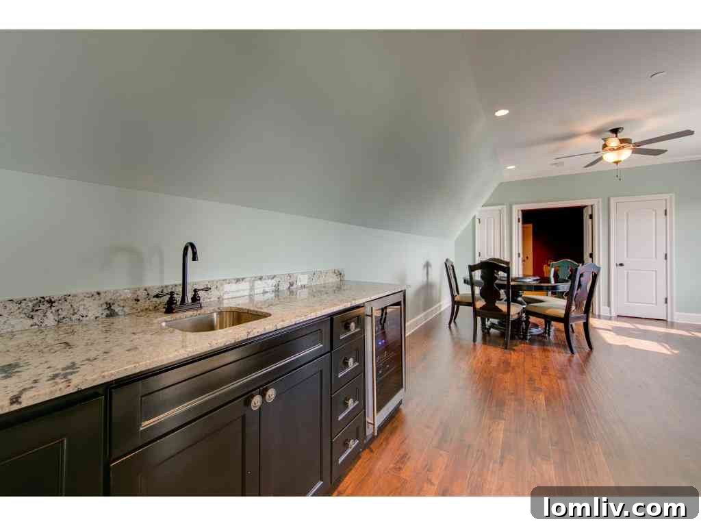 Covered patio area ideal for outdoor dining and relaxation, overlooking the spacious backyard, Lucas TX.