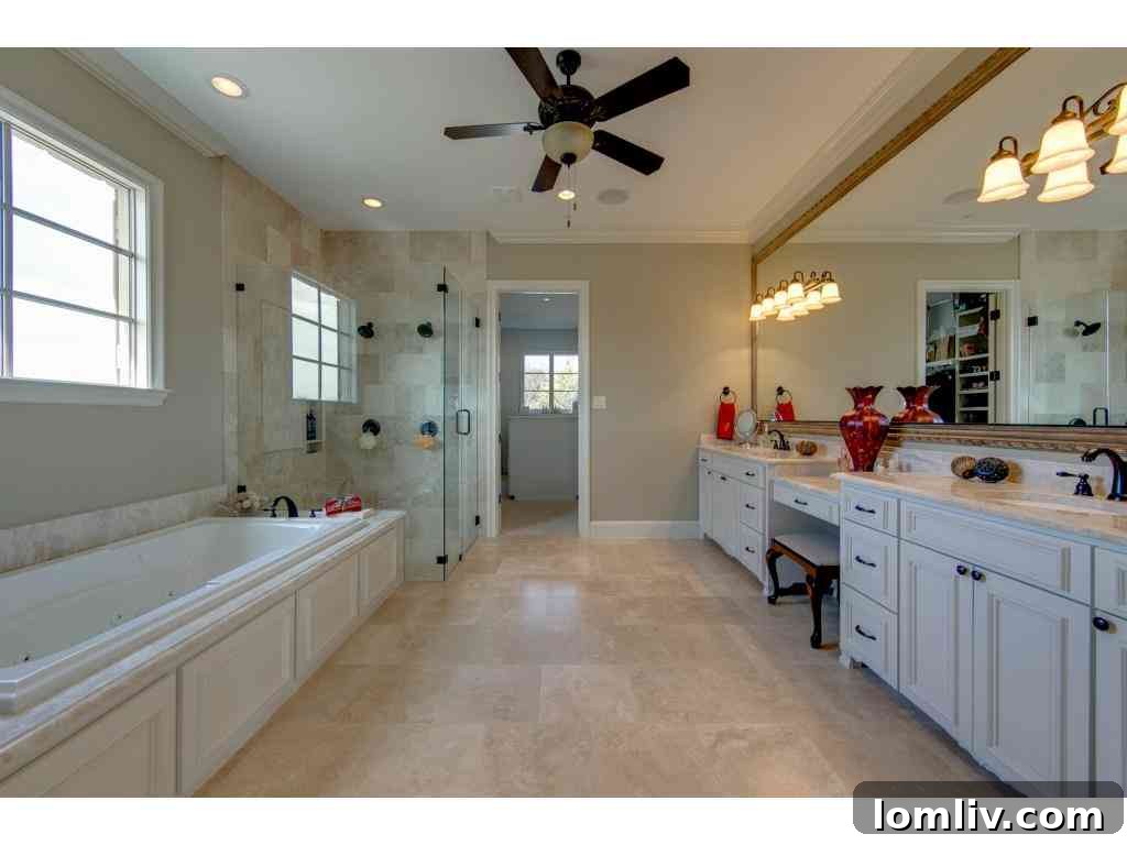 View of the private pond with elegant fountain, offering a serene and picturesque ambiance, 415 Blondy Jhune Road.