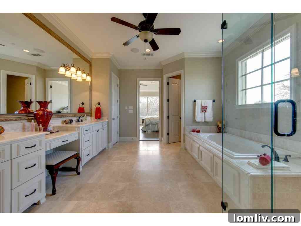 Spacious three-car garage with durable epoxy flooring and ample storage solutions, Lucas TX home.