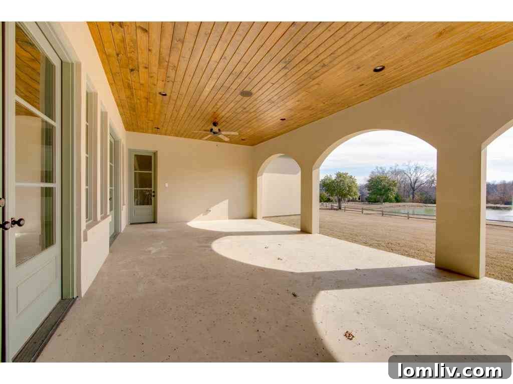 Panoramic view of the expansive backyard and the surrounding natural environment, highlighting the privacy of 415 Blondy Jhune Road.