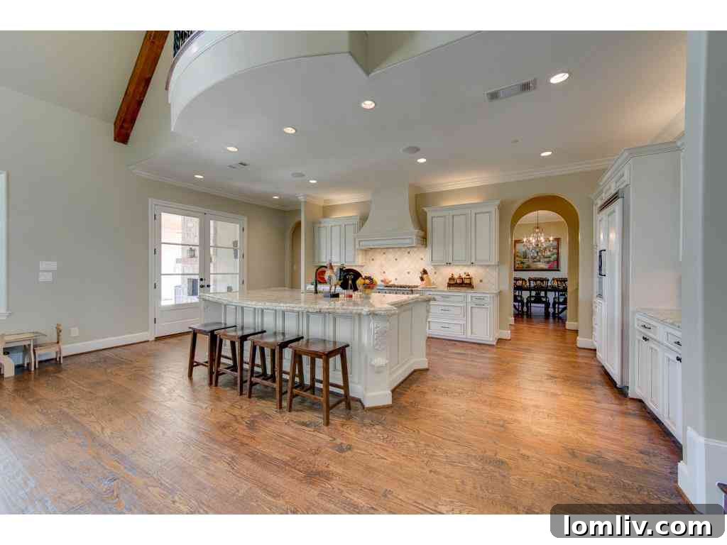 Gourmet kitchen featuring state-of-the-art appliances, a large center island, and custom cabinetry, Lucas TX.