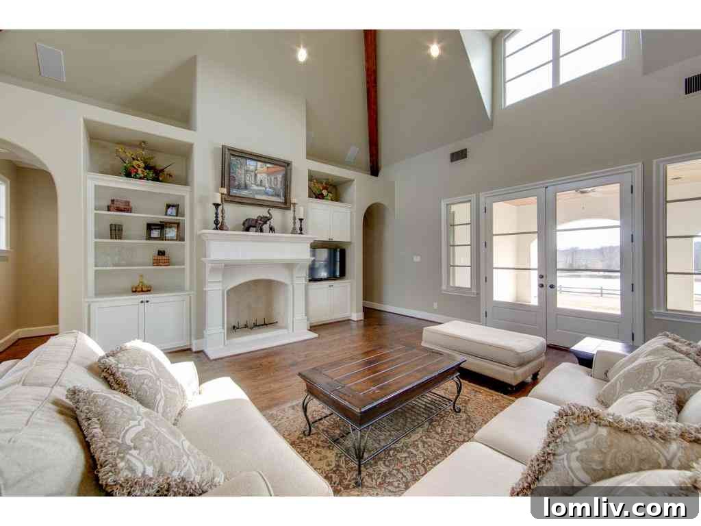Master bedroom with ample natural light, serene decor, and direct outdoor access, Lucas TX home.