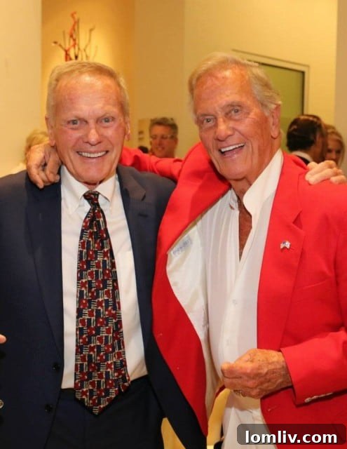 Hollywood legends Tab Hunter and Pat Boone sharing a moment at the USA Film Festival