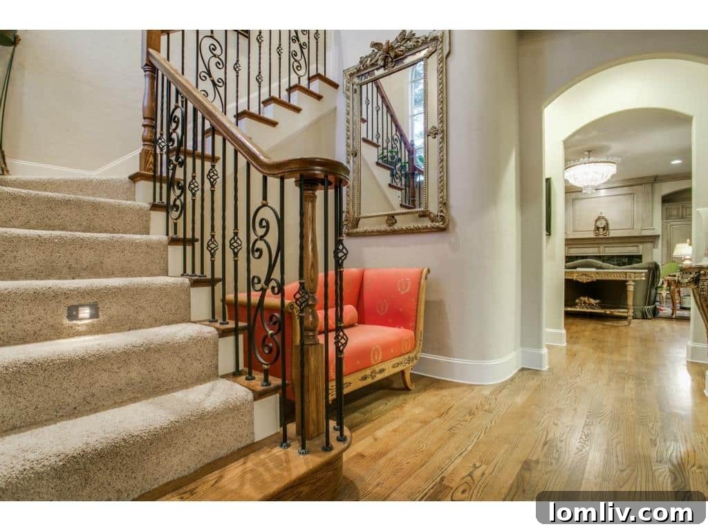 Grand Foyer with Antique Wood Door in Lake Forest Home