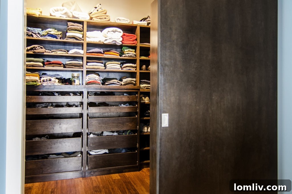 Spacious walk-in closet with custom shelving at Adrian Drive