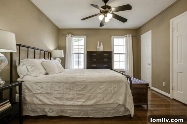Spacious master bedroom with natural light