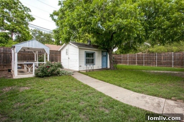 Charming gazebo or pergola with picnic table in backyard