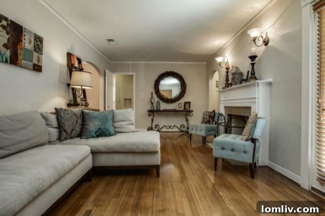 Arched doorway connecting living and dining areas