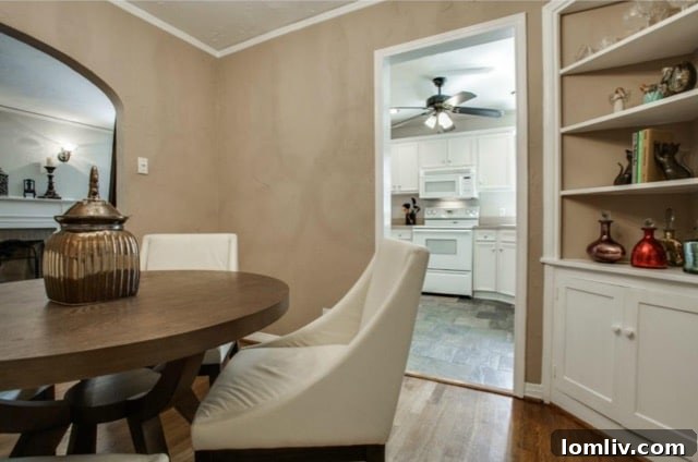 French doors leading from dining room to second living area