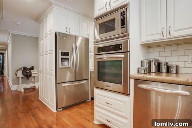 Breakfast bar area in a brightly lit, renovated kitchen