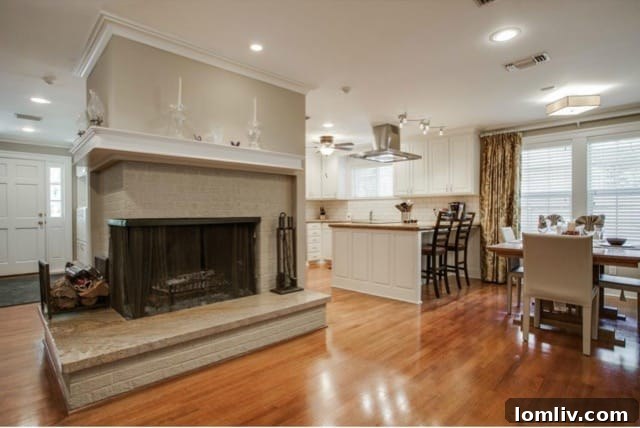 Spacious living room with modern fireplace and ample seating area
