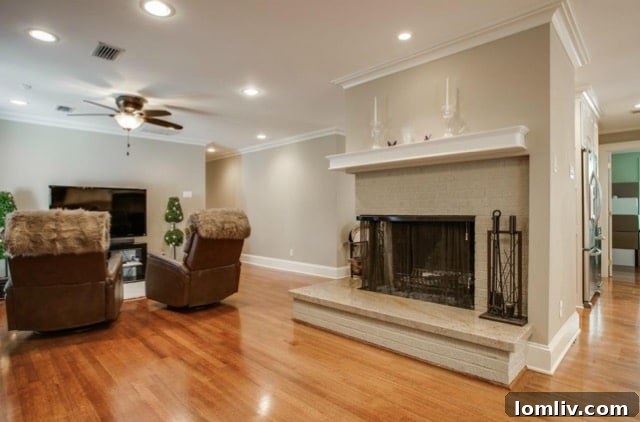 Bright interior showcasing renovated layout and hardwood flooring