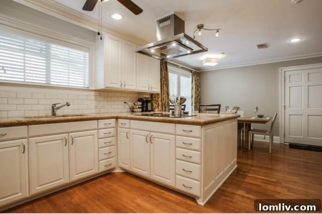 Modern kitchen with subway tile backsplash and granite countertops