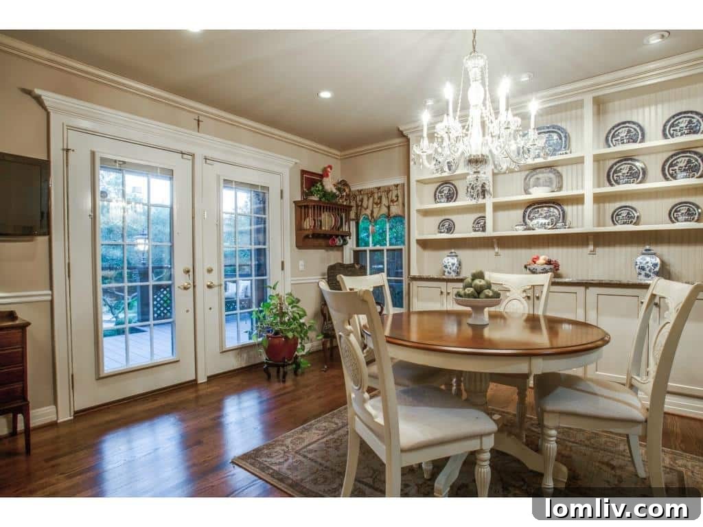 Charming breakfast nook with bead board hutch and garden views