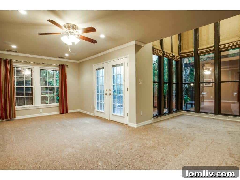 Bright and airy sunroom overlooking the backyard paradise