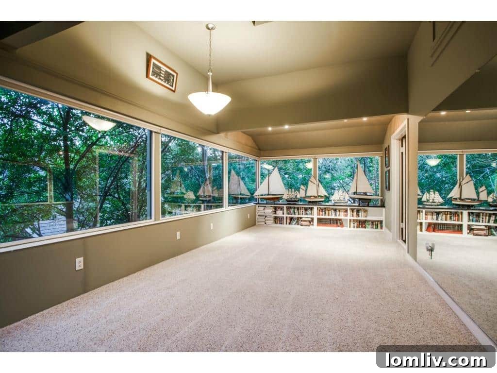 Private sun porch off the luxurious master bedroom