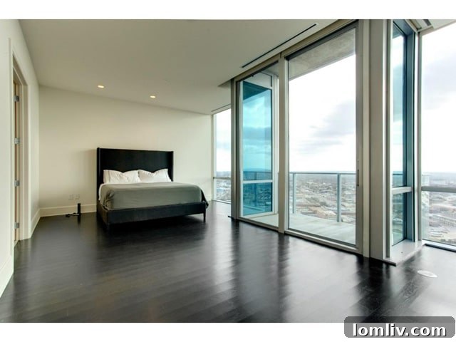 Omni-FW-Penthouse-Master - Luxurious Master Bedroom with Private Balcony