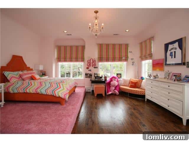 Troy Aikman's Normandy Home Under New Ownership 19 Charming child's bedroom, decorated with playful and inviting elements.