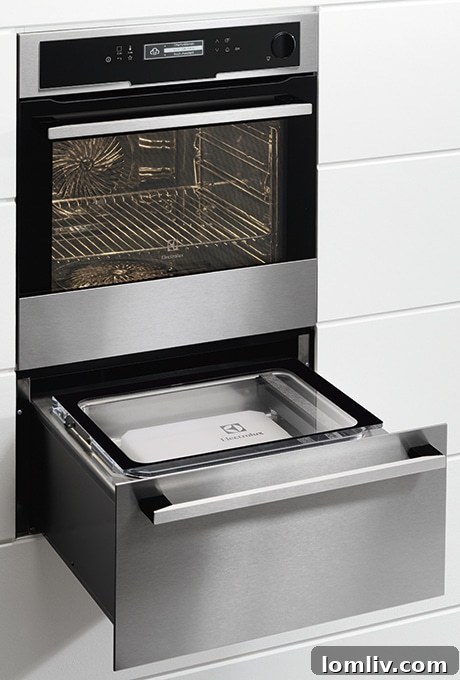 Electrolux Sous Vide oven drawer, showing vacuum-sealed food ready for precise cooking.