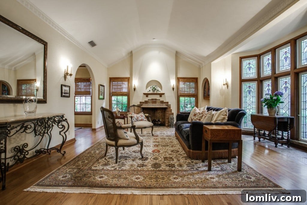Elegant living room with Batchelder style fireplace in Lakewood home