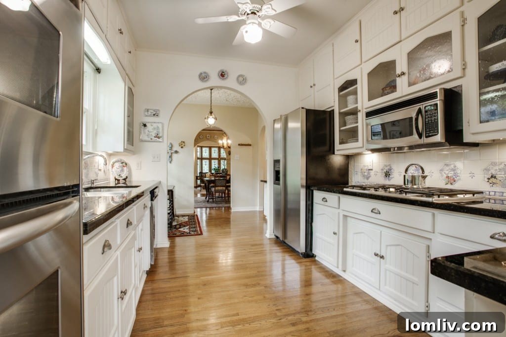 Charming kitchen with seeded glass cabinets in vintage Lakewood house