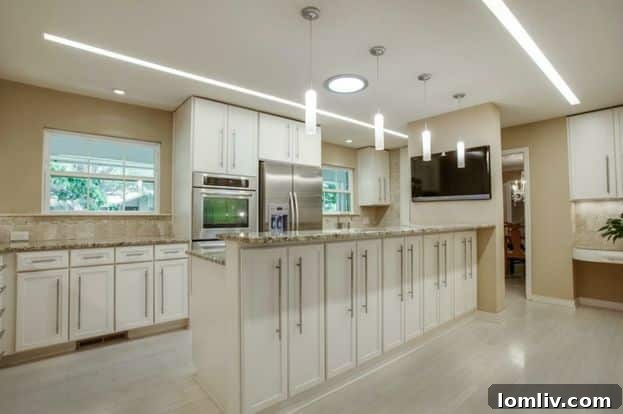 Elegant living space with updated flooring and ample natural light