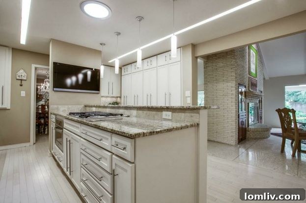 Stylish bathroom with contemporary fixtures and light-colored finishes