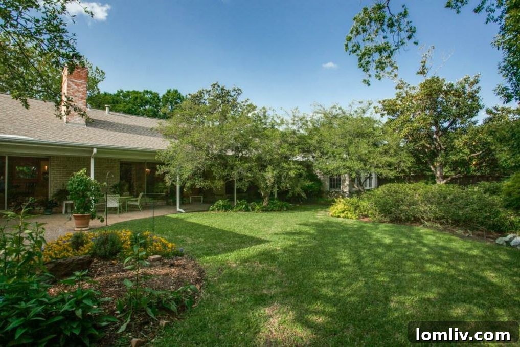 Aerial view showing the expansive lot and mature landscaping of 4510 Hallmark Drive