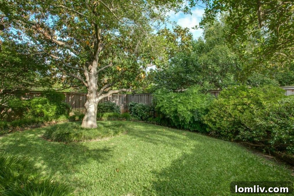 Lush foliage and mature landscaping surrounding the historic Dallas residence