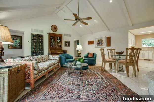 Interior atrium view with lush plants and natural light in Landry's former home