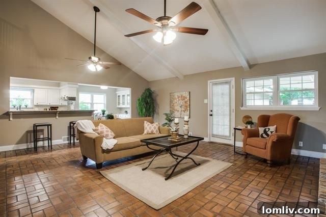 The open staircase leading to an upstairs landing overlooking the main living area