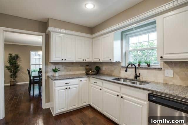 Detail of the kitchen's ample counter space and oil-rubbed fixtures