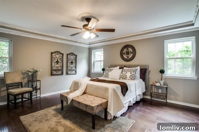 Spacious and bright downstairs master bedroom with recessed ceiling